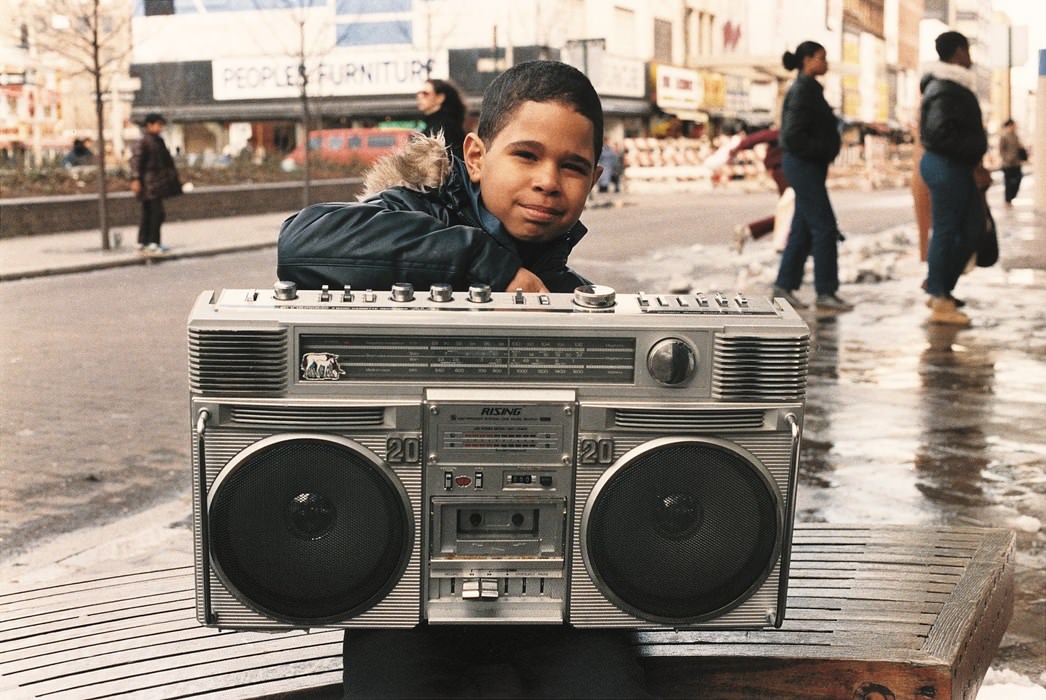 Jamel Shabazz's back in the day old street photographs, boy with boombox.